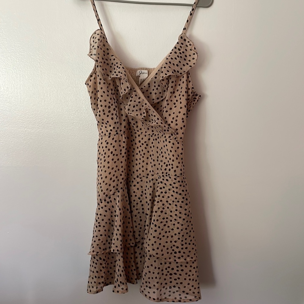 Tan and black polka dotted romper